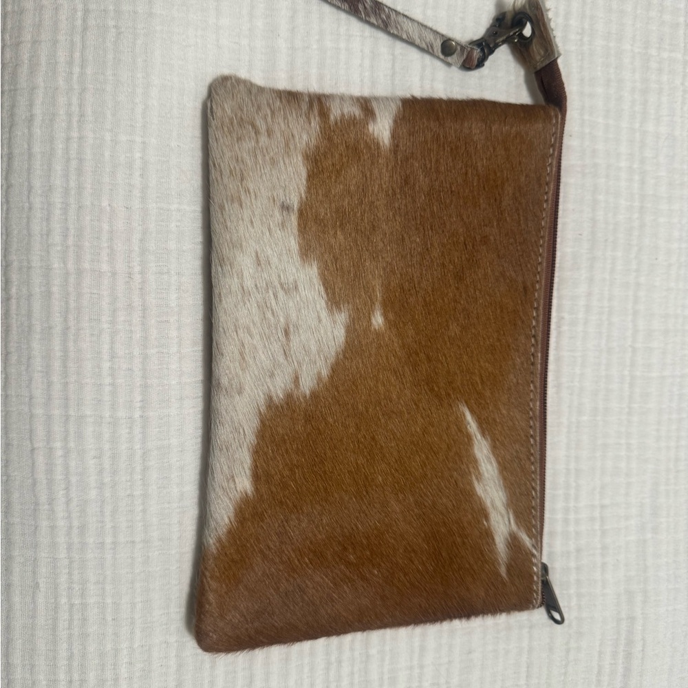 Brown and White Cowhide Clutch